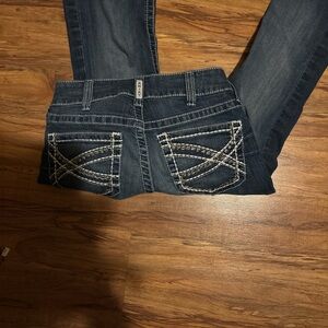 Ariat real denim mid rise boot cut jeans.